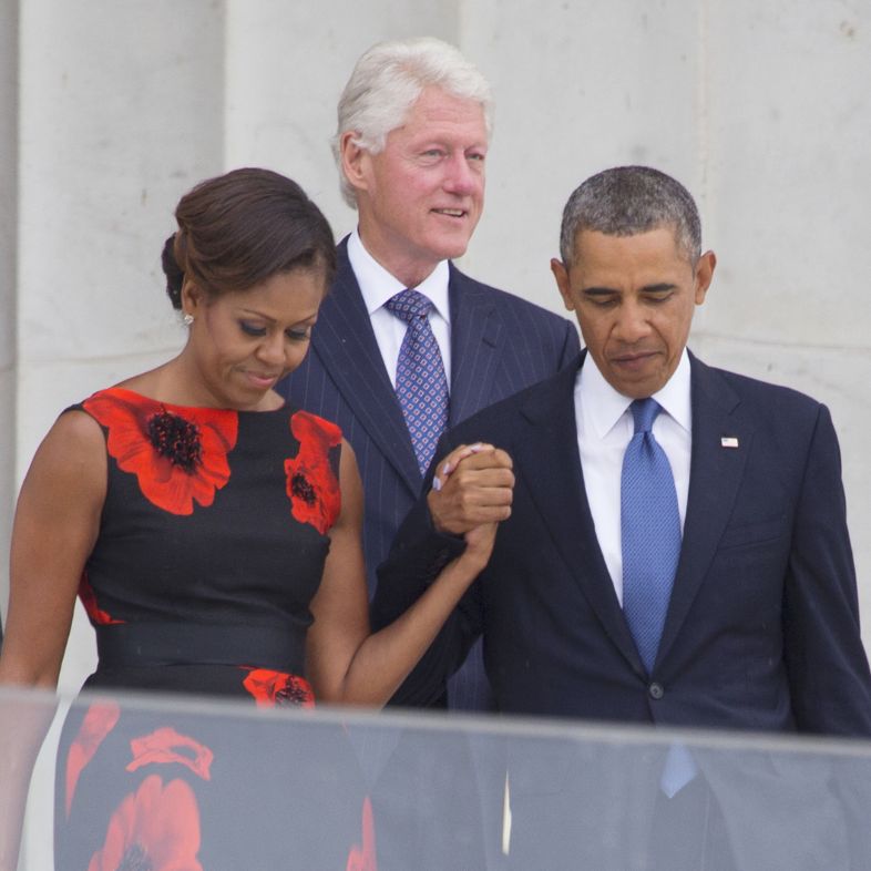 President Barack Obama, First Lady Michelle Obama and former Presidents Jimmy Carter and Bill Clinton arrive for the ceremony to commemorate the 50th anniversary of the March on Washington
