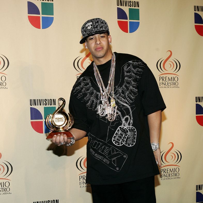 Daddy Yankee celebrates winning the Urban Gender Artist of the Year award at the Premio Lo Nuestro Award Show, at the American Airlines Arena in Miami, Florida on February 23, 2006
