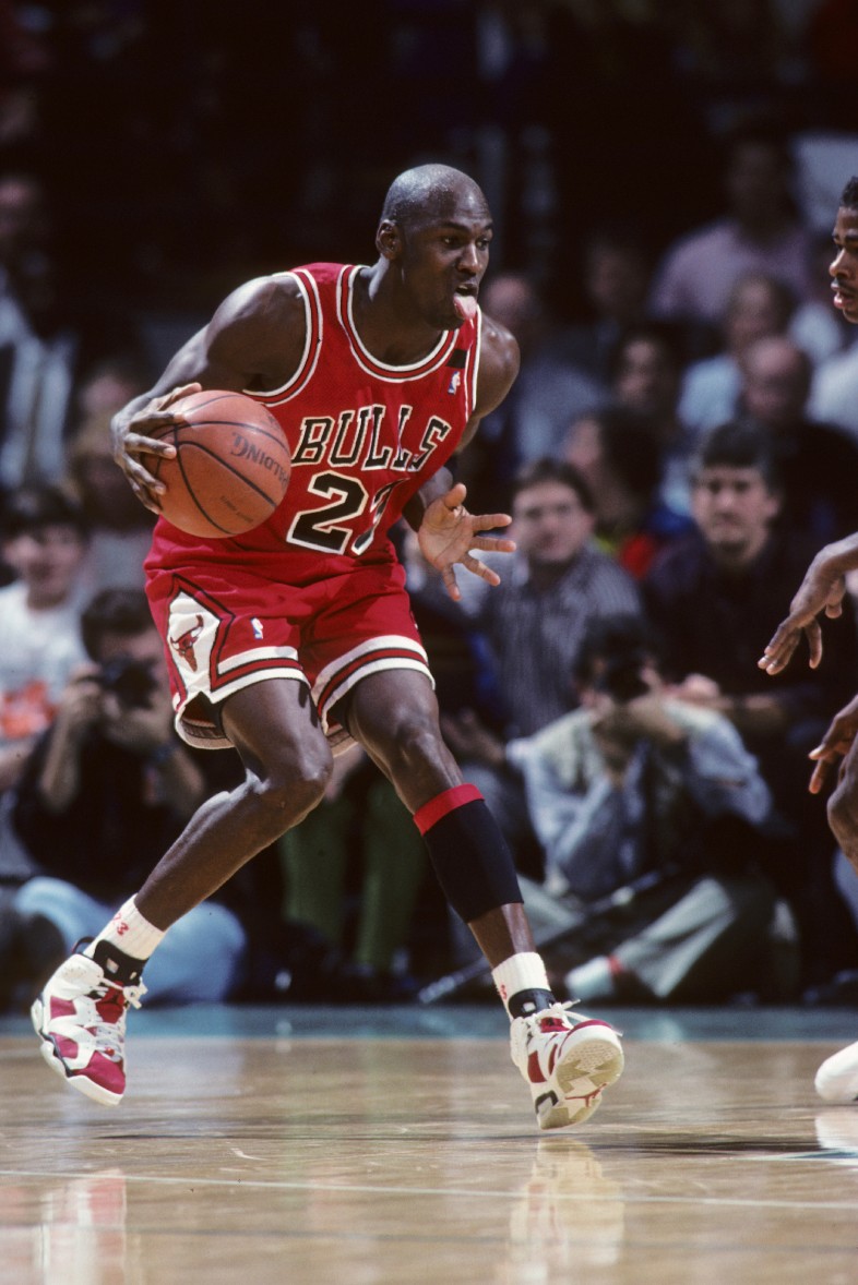Michael Jordan Hall of Famer for Chicago Bulls in game action during NBA regular season game