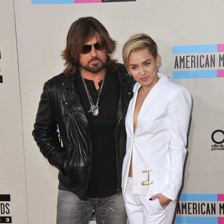 Miley Cyrus & father Billy Ray Cyrus at the 2013 American Music Awards at the Nokia Theater