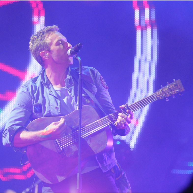 Coldplay lead singer Chris Martin performing at the Rock in Rio held at Parque Olimpico Cidade do Rock in Barra da Tijuca