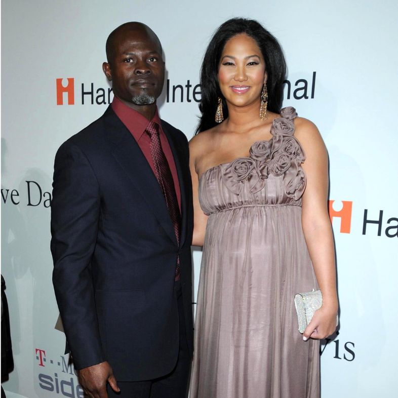 Djimon Hounsou and Kimora Lee at the Salute To Icons Clive Davis Pre-Grammy Gala. Beverly Hilton Hotel, Beverly Hills, CA. 02-07-09