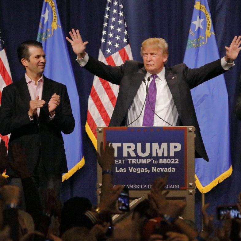 Donald Trump is flanked by sons Eric (Right) and Donald Jr. (Left) during Mr. Trump s victory speech following big win in Nevada caucus, Las Vegas, NV at Treasure Island Casino and Hotel