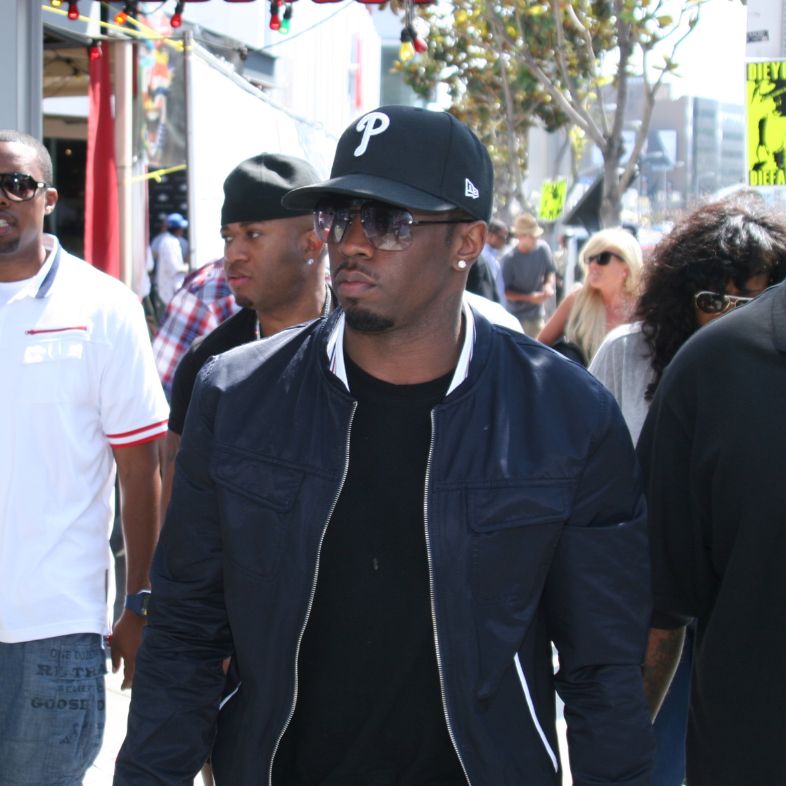 Sean P Diddy Combs and his entourage arrive at the Sean John pop-up store on Sunset Blvd. in Los Angeles, California.