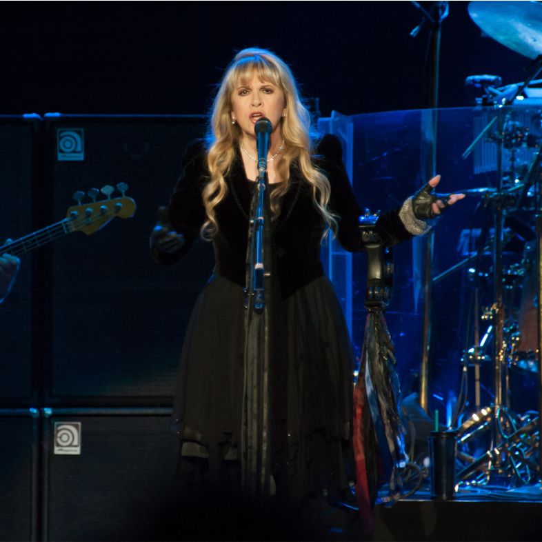 John McVie (L) and Stevie Nicks of Fleetwood Mac perform in support of the bands Extended Play release at Sleep Train Arena on July 6, 2013 in Sacramento, California